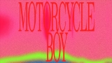 Videominiatuur Motorcycle Boy